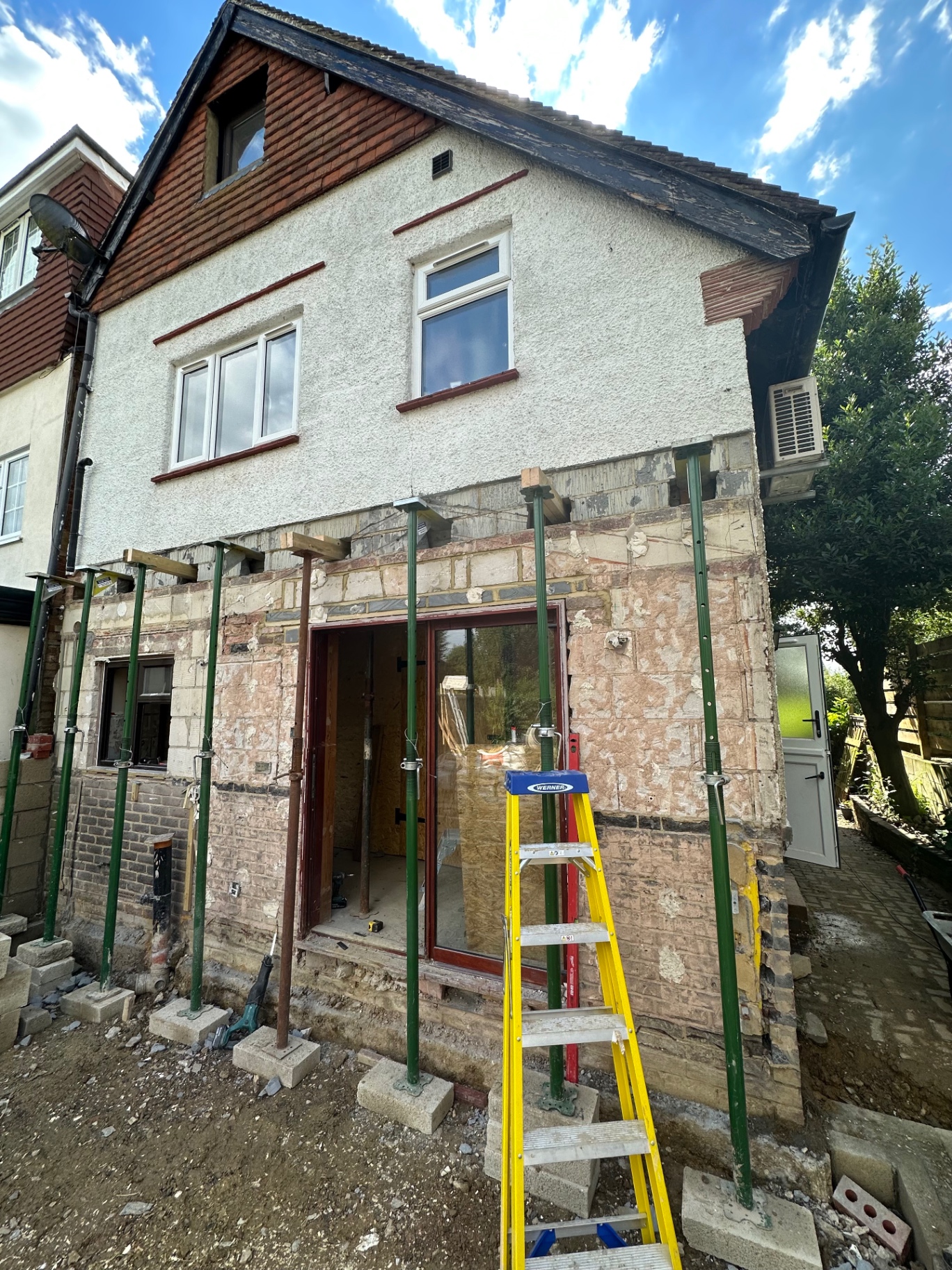 Temporary supports in place while the rear structure is opened up